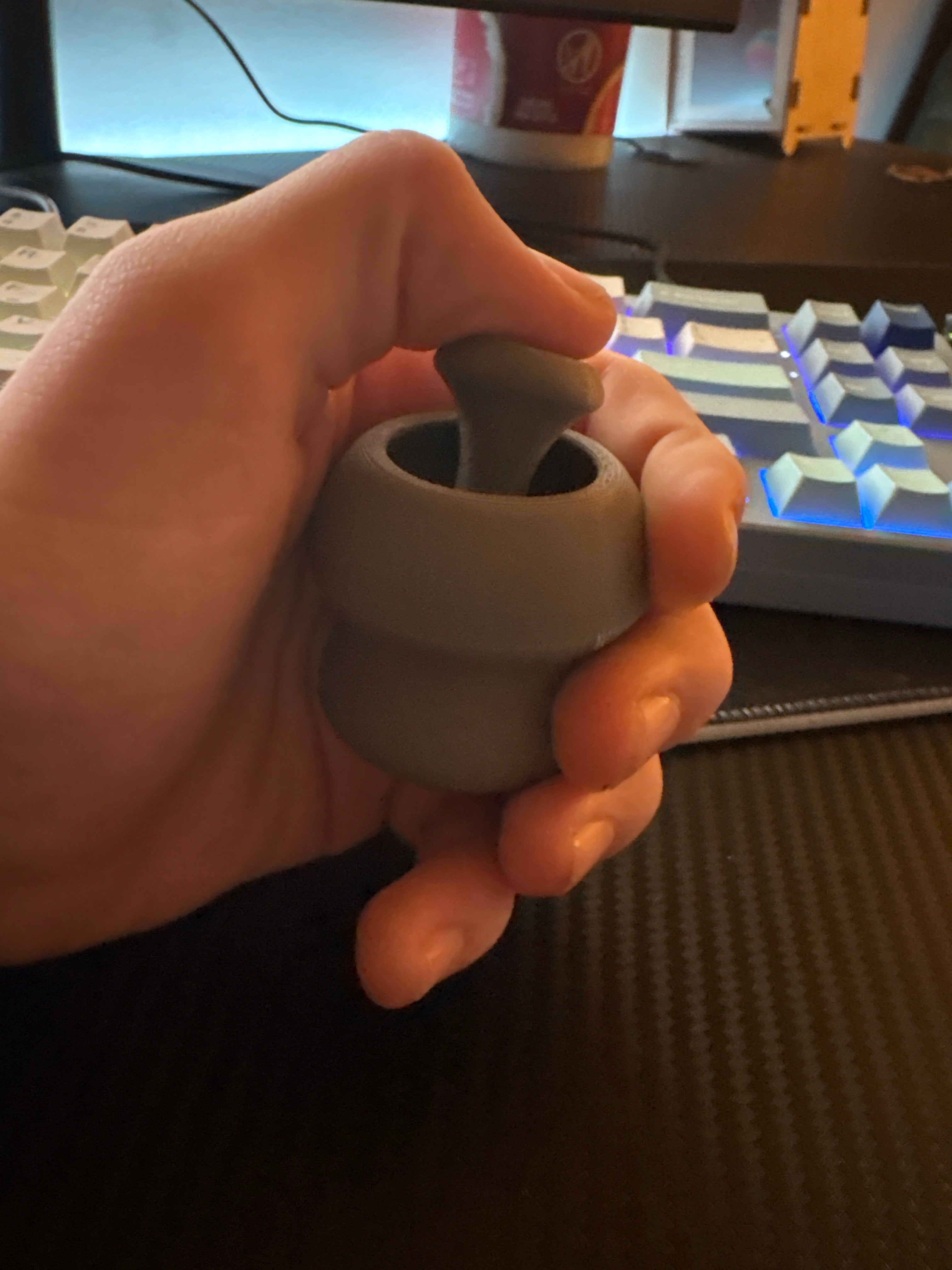 1 gray joystick fidget toy